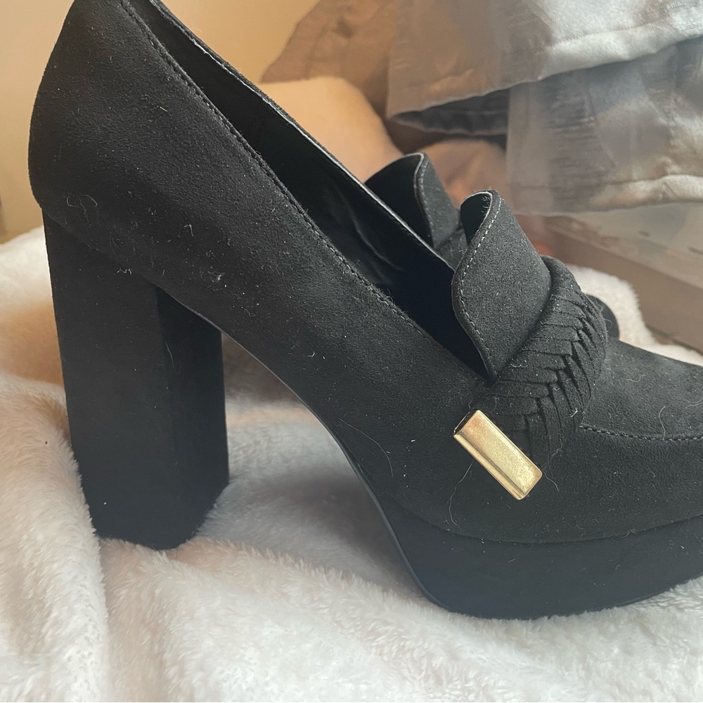 Black loafer heels.  Just Fab size 7.